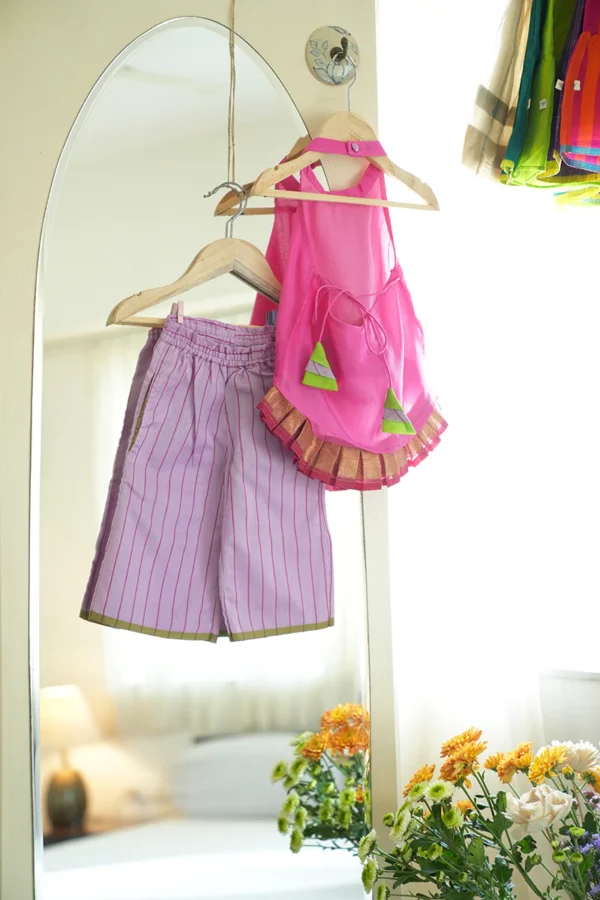 Madhu Malti girls ethnic wear set with pink halter top and lilac flared pants
