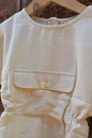 ‘Carry Kindness’ | Unisex jumpsuit with big center pocket in handwoven kora cotton - Image 4