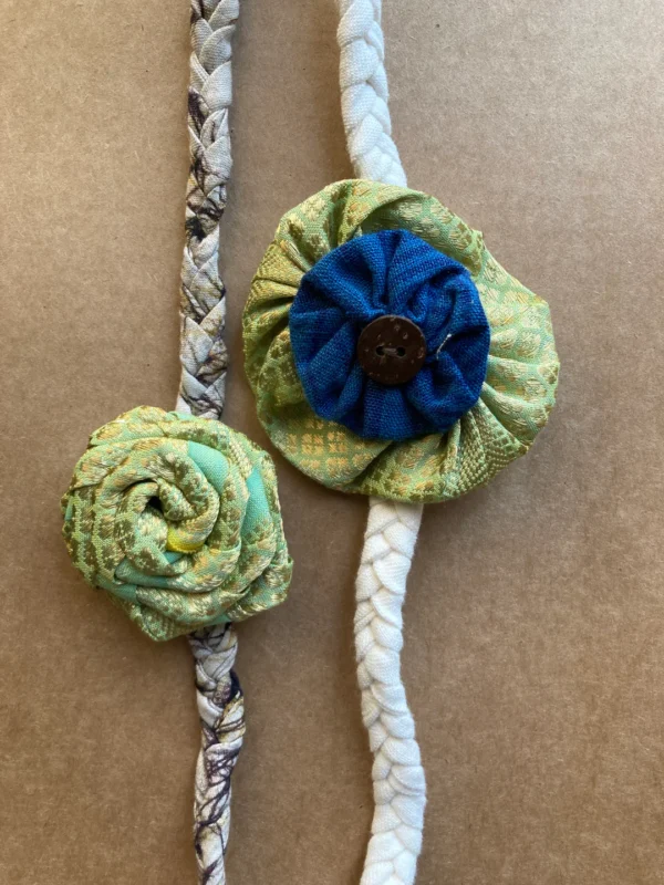 Redefining sibling love - Sea green gold rose batik band with blue rakhi (Set of 2)